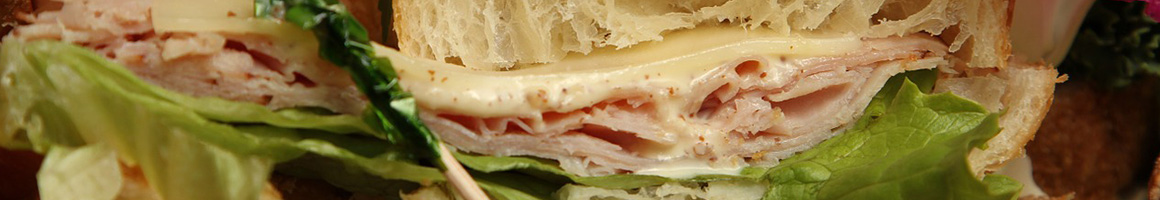 Eating Deli Sandwich at Colombo's Delicatessen - Pacifica restaurant in Pacifica, CA.
